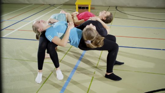 Partnerakrobatik III Statische Akros: Chair Challenge